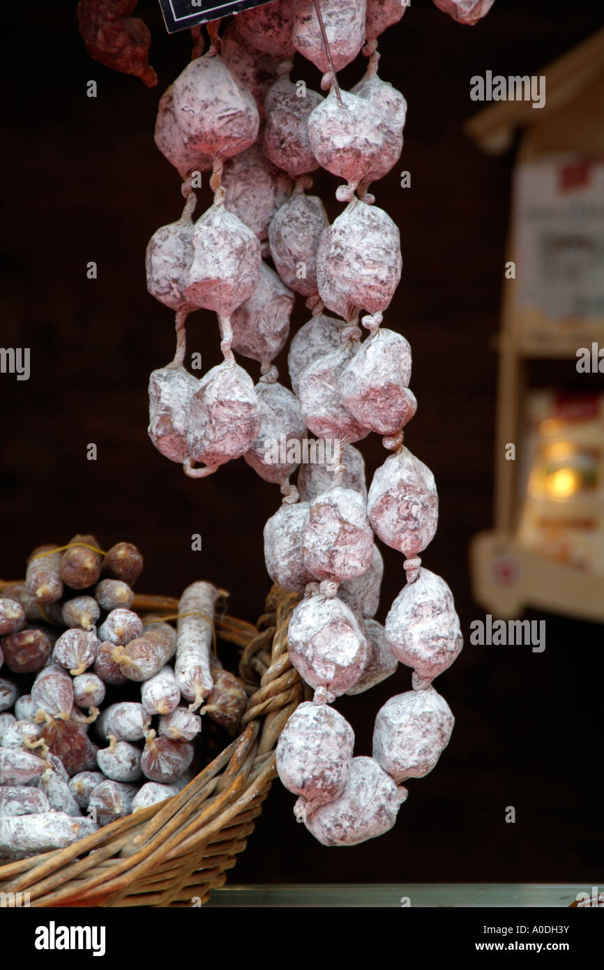 Chapelet dried pork sausage hanging in a market stall. France Europe EU Stock Photo