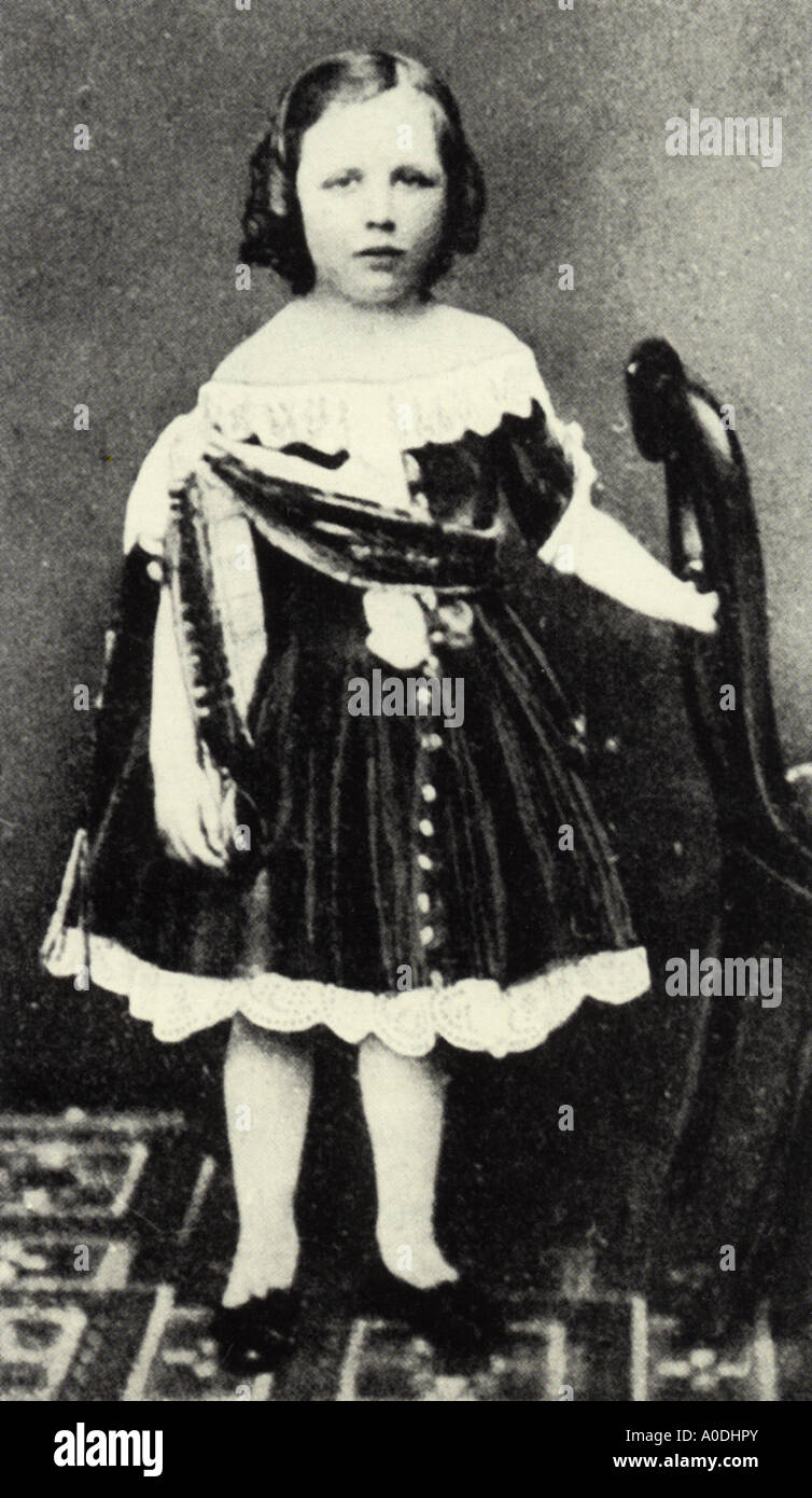 OSCAR WILDE Irish writer 1854 to 1900.  Victorian convention often made boys wear girls clothes. Stock Photo