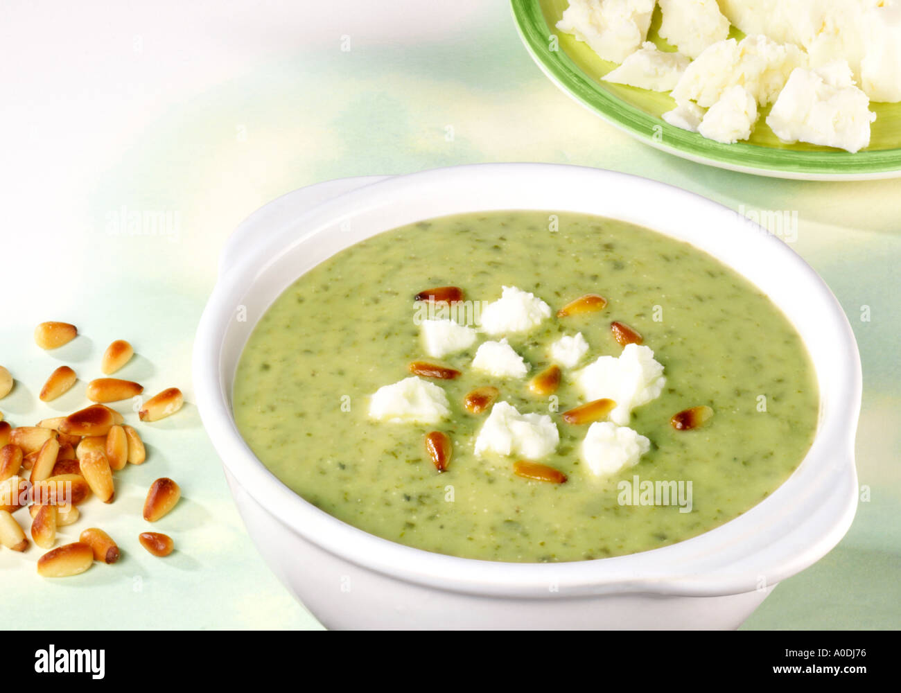 WATERCRESS SOUP WITH FETA AND PINE NUTS Stock Photo