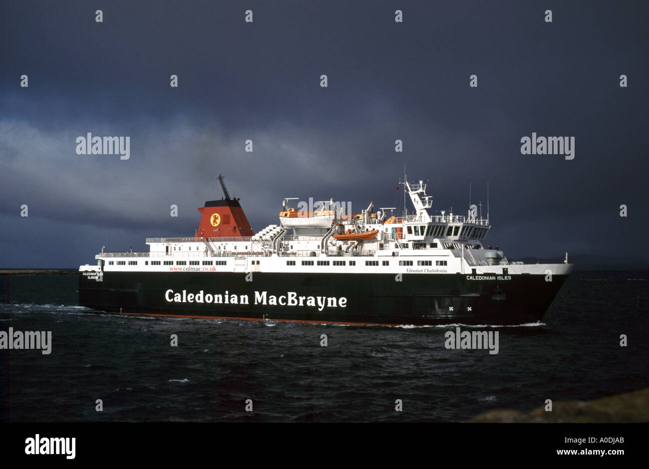 CalMac ferry Caledonian Isles approaching Ardrossan harbour from Arran on a cold wintry day Stock Photo