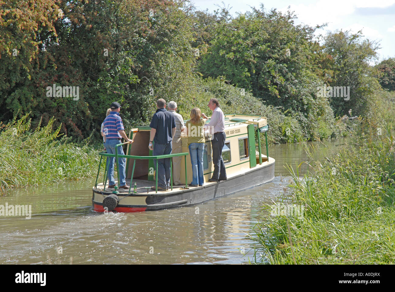 Family enjoying day out on hired day boat on Kennet & Avon canal in Witshire, England UK Stock Photo