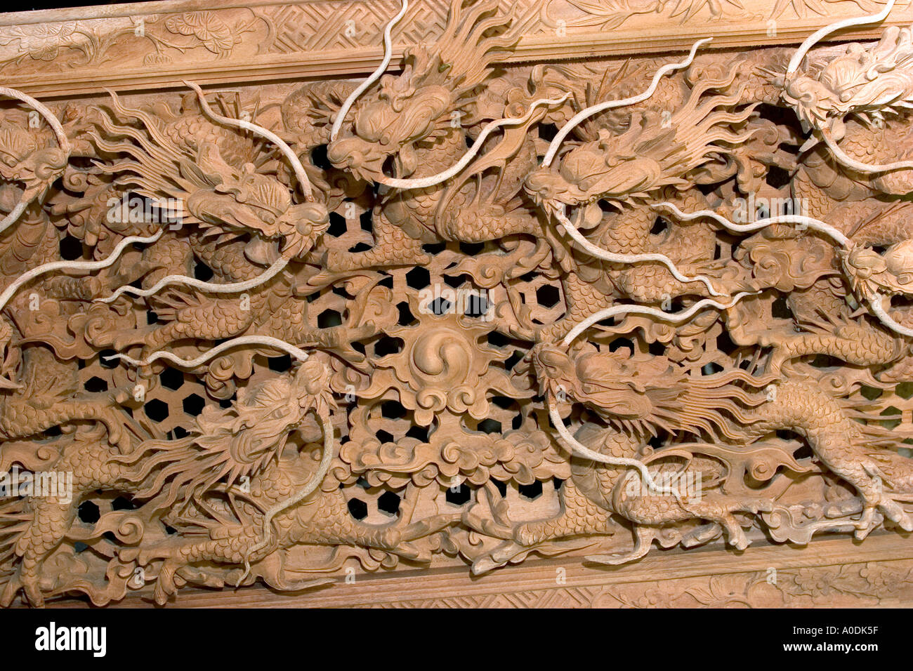 Vietnam Central Hoi An Old Town crafts Kim Bong Traditional Carpentry workshop deeply carved dragon panel detail Stock Photo