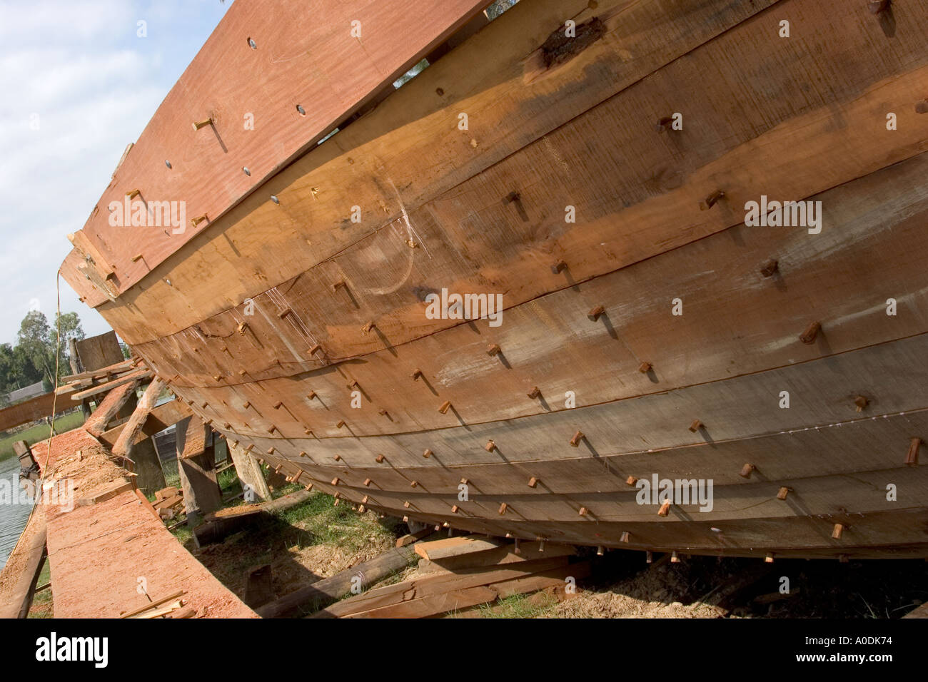 Vietnam Hoi An Cam Kim Island boatbuilding wooden pegs fixing planks to hull Stock Photo