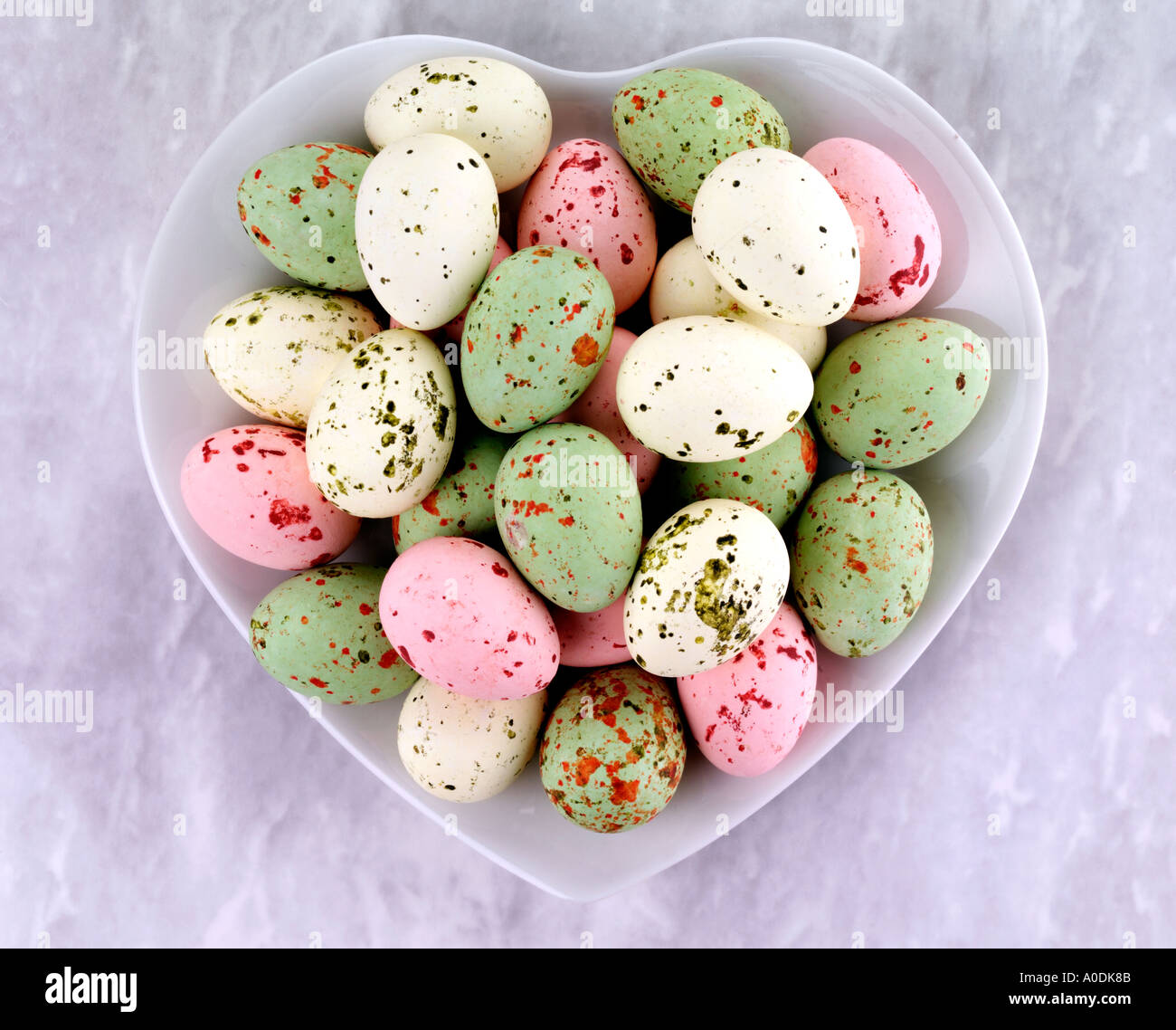 SPECKLED EASTER EGGS IN HEART SHAPED DISH Stock Photo