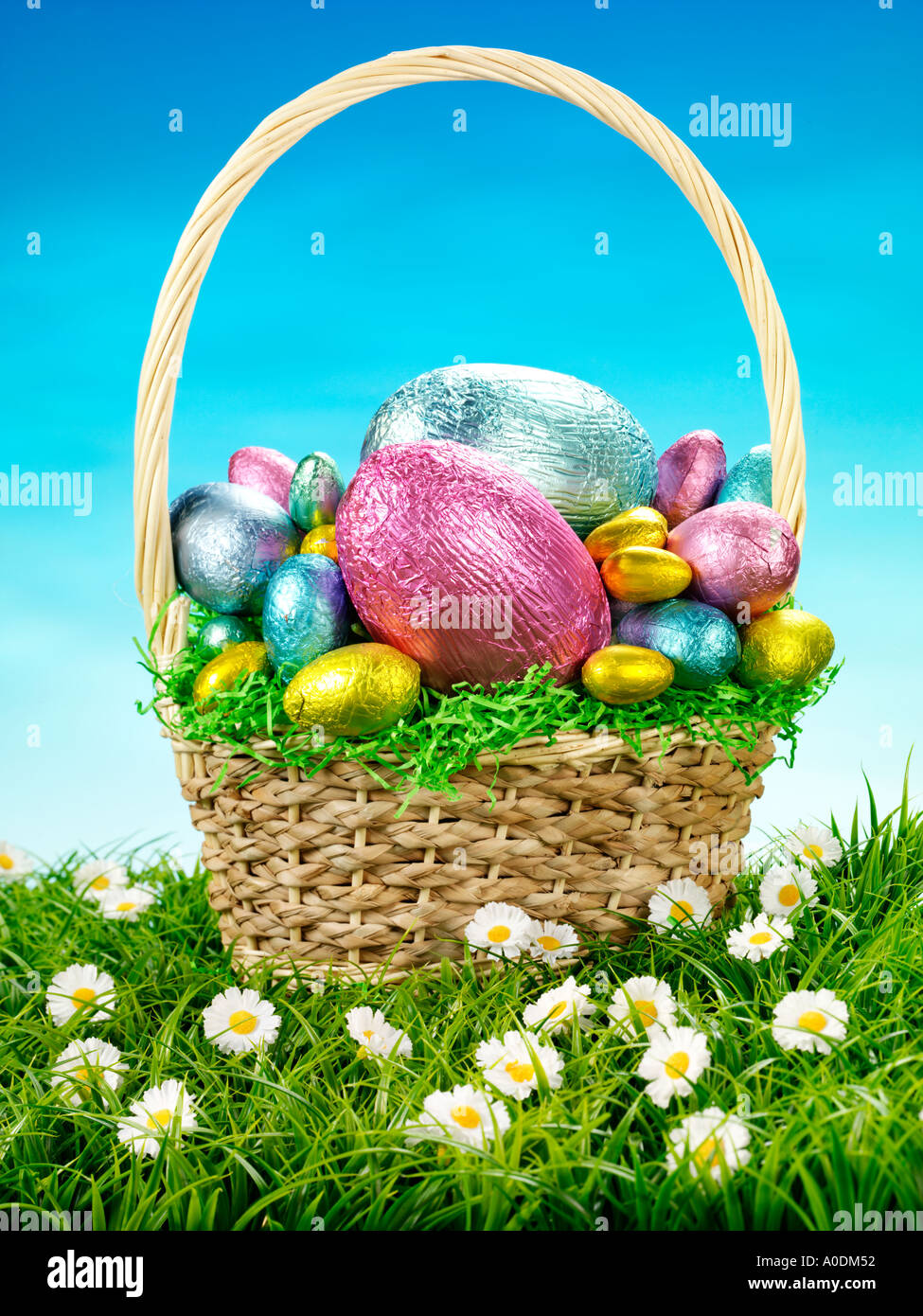 CHOCOLATE EGGS IN BASKET Stock Photo