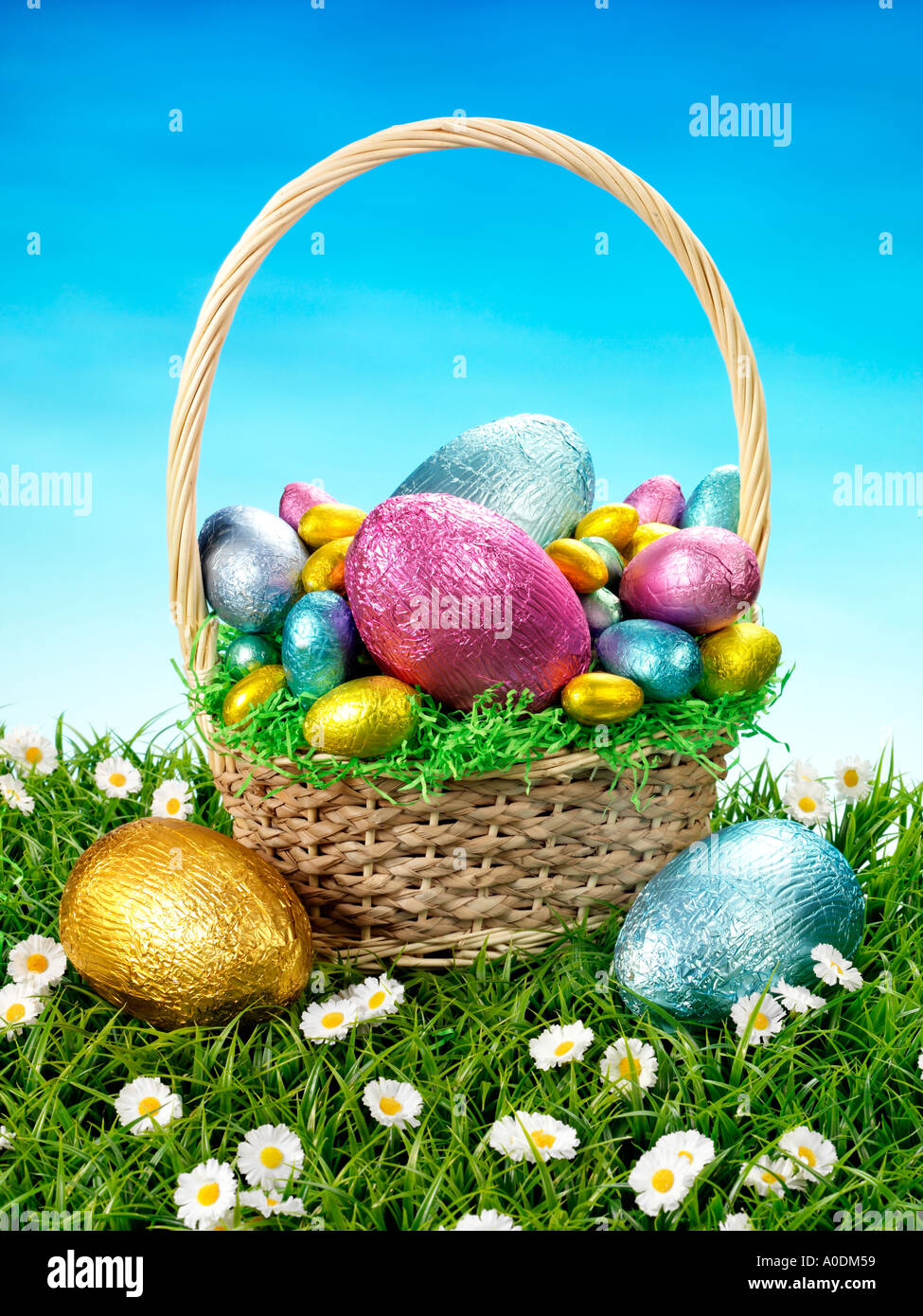 CHOCOLATE EGGS IN BASKET Stock Photo