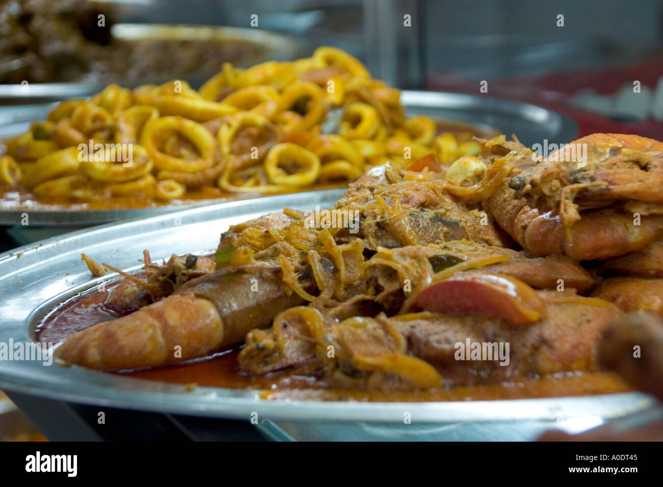 Curried prawns in an Indian restaurant in Singapore Stock Photo