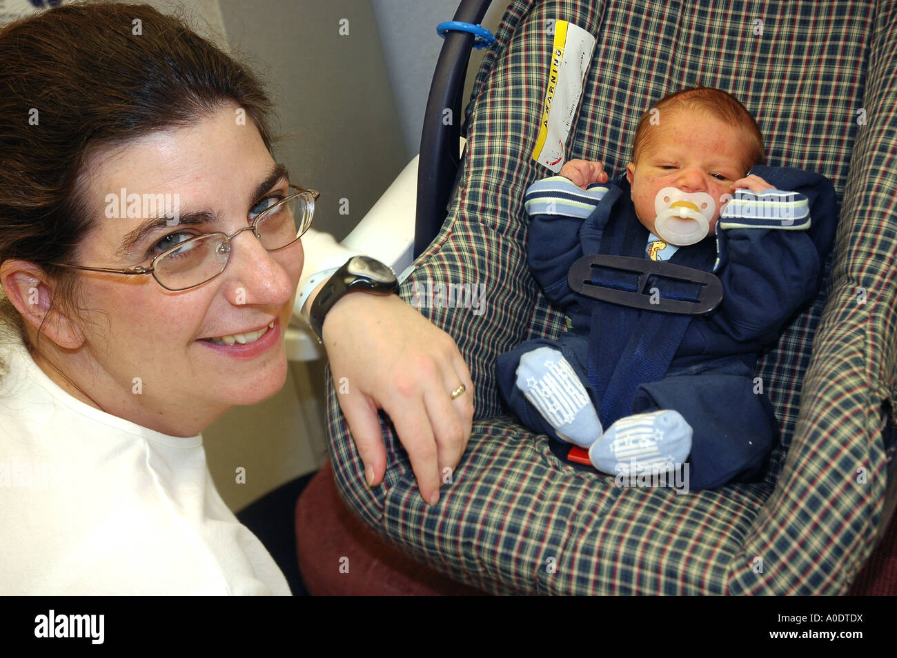 A new mom prepares to leave the hospital with her new born baby boy