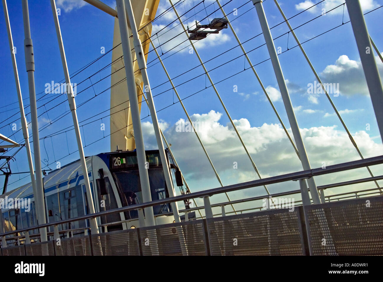 Tram crossing over the Enneüs Heerma Bridge in Amsterdam, The Netherlands Stock Photo