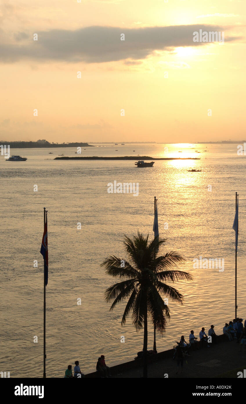 The sun rises over the Cambodian capital Phnom Penh where the Tonle Sap and Mekong rivers come together Stock Photo
