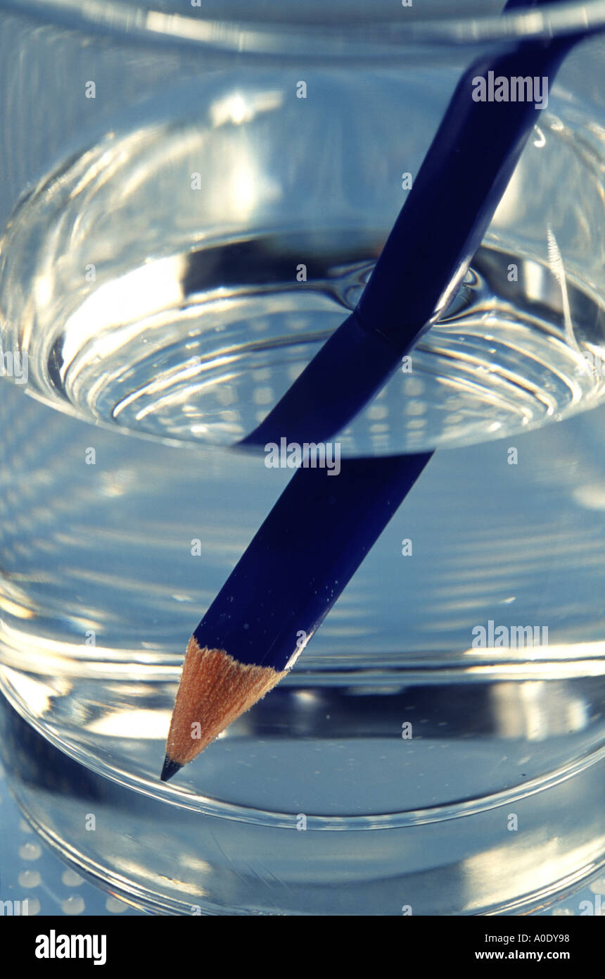 Pencil in a glass of water Stock Photo Alamy