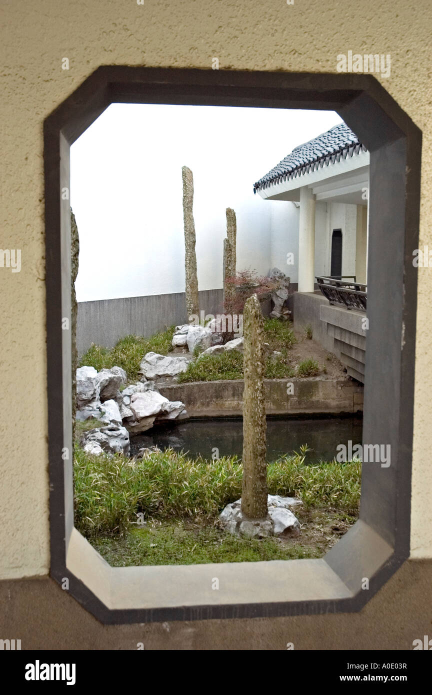 Picture Window looking out onto a  Rock Garden, Bamboo Grove Ramada, Souzhou Stock Photo