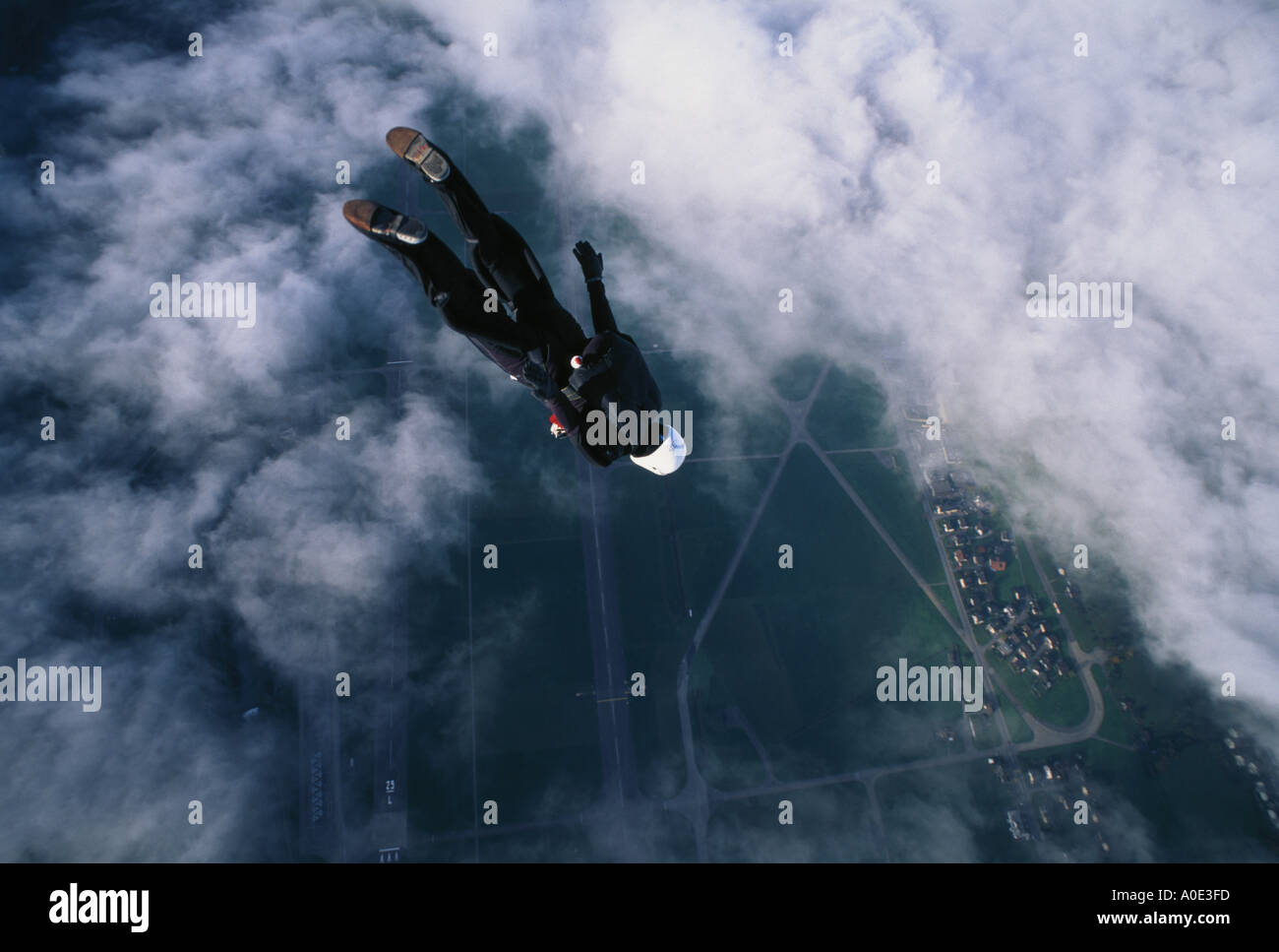 Diving through a cloud layer Stock Photo Alamy