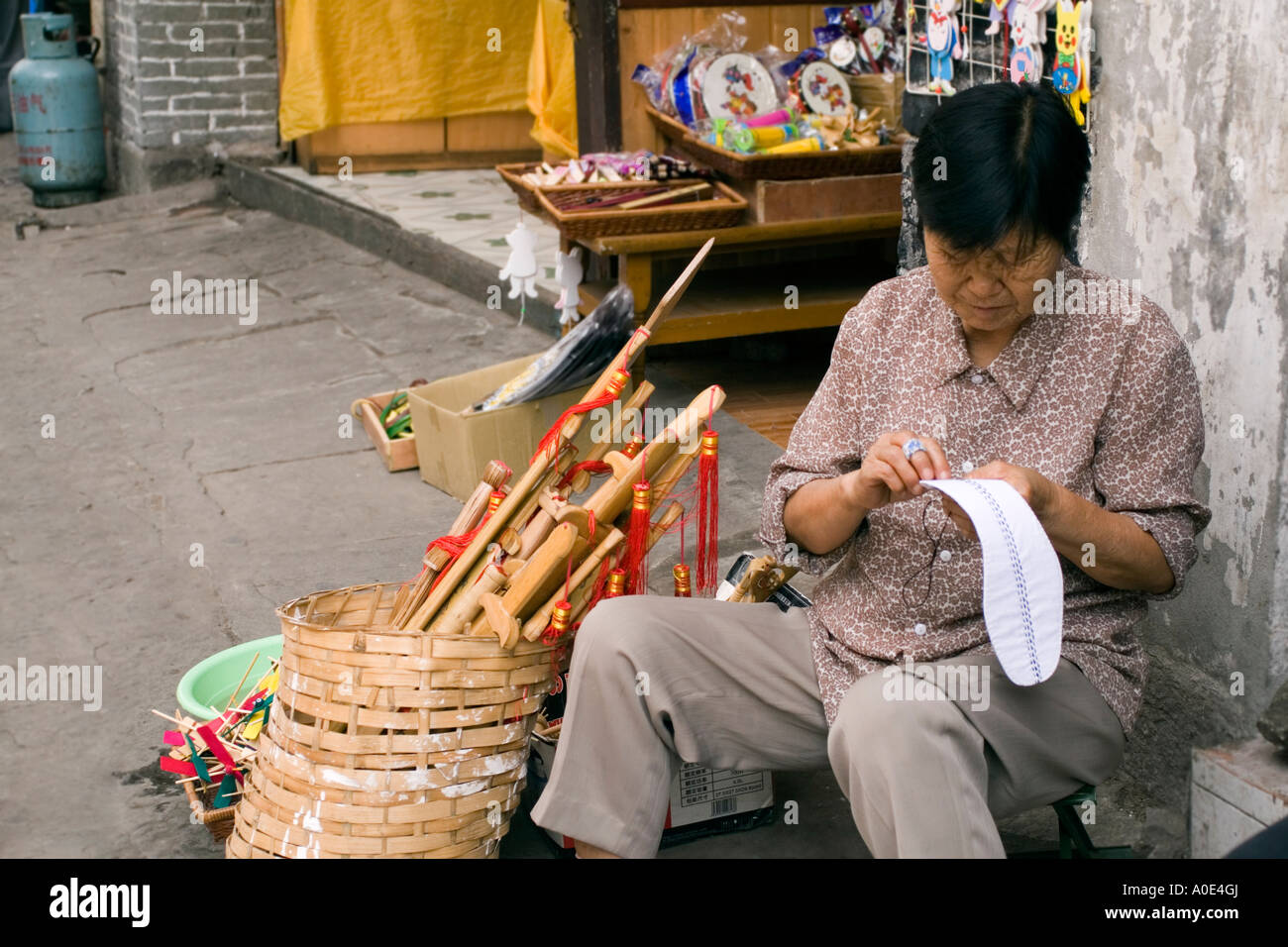 Chinese woman knitting hires stock photography and images Alamy