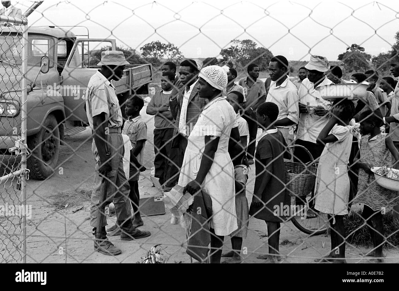 Villagers are searched before entering on of Rhodesia's protected villages. Stock Photo