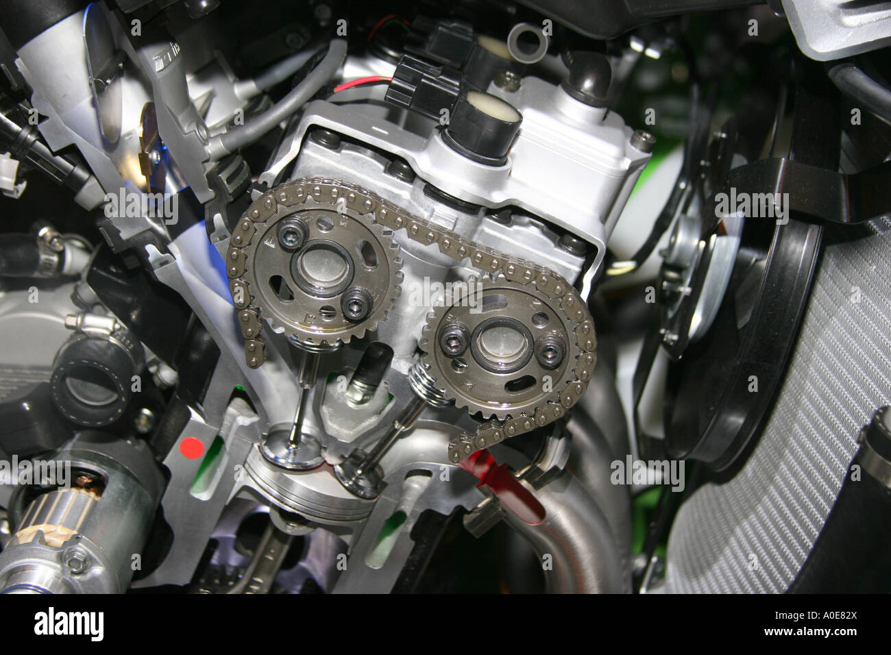Cut away full size model of a motorcycle engine showing valves and