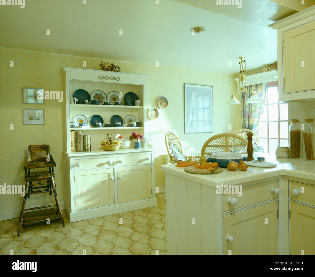 Yellow Kitchen With Painted Dresser Stock Photo 9969376 Alamy