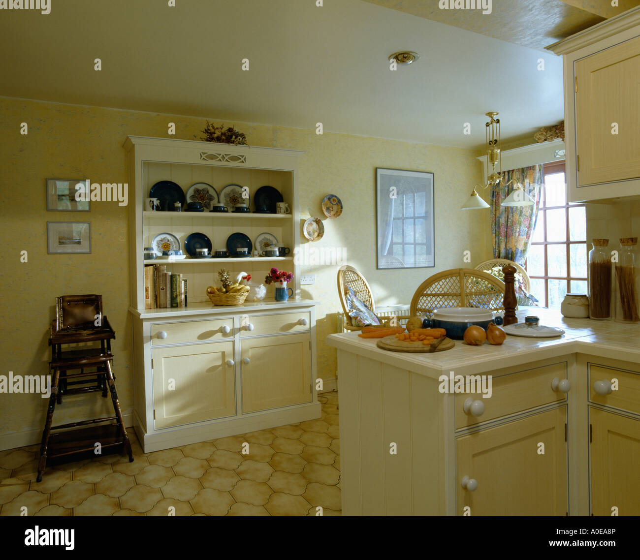 Yellow Kitchen With Painted Dresser Stock Photo 9969669 Alamy