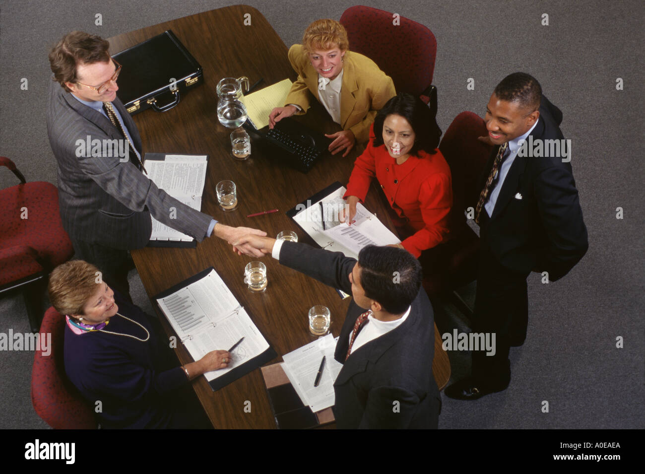 Business people closing deal Stock Photo