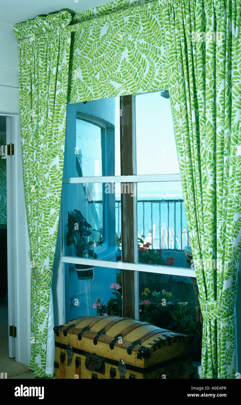 Close Up Of Green White Floral Patterned Curtains With Matching