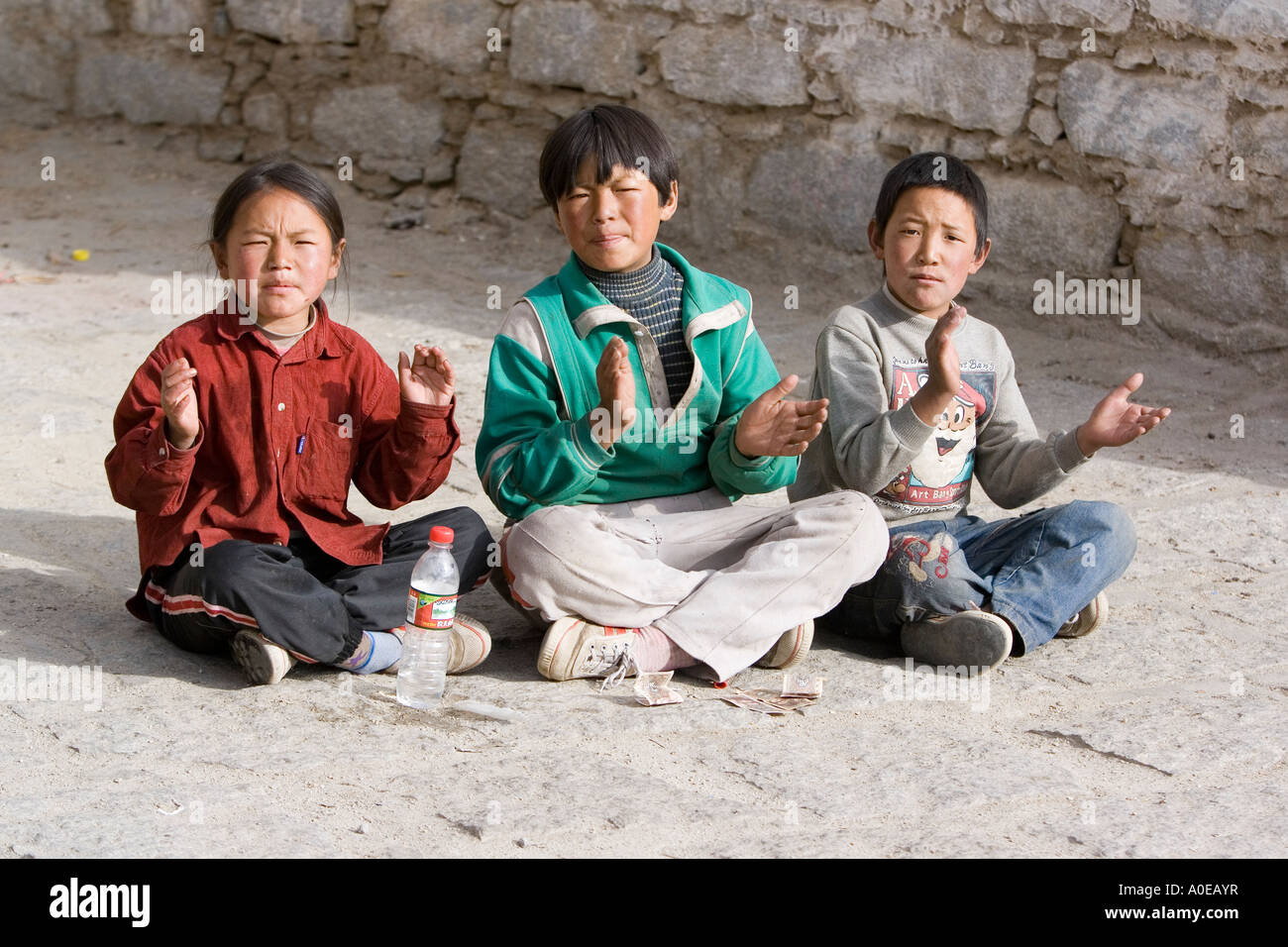 Three children- Drepung Monastery Lhasa Tibet Stock Photo