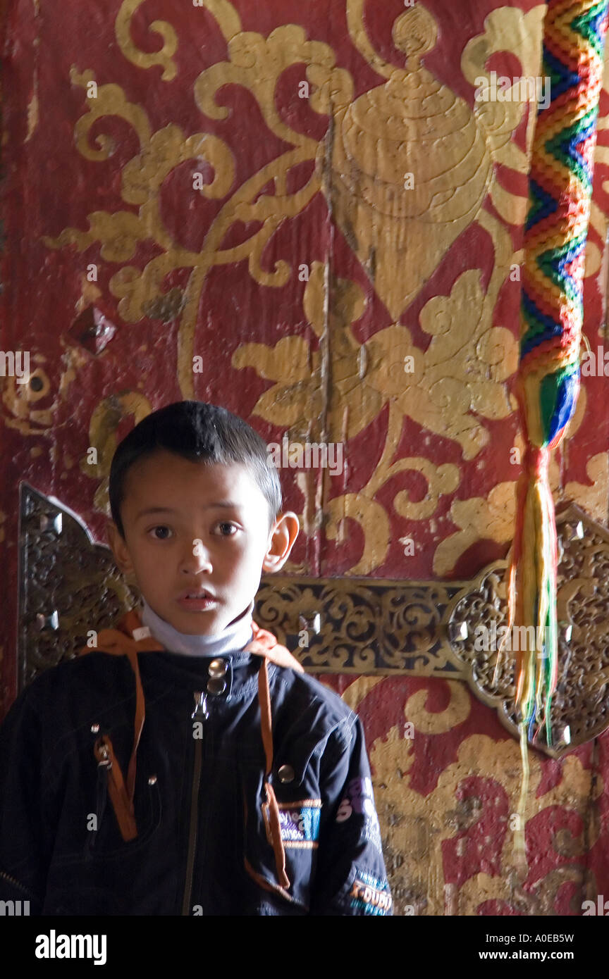 Young boy at door- Drepung Monastery Lhasa Tibet Stock Photo