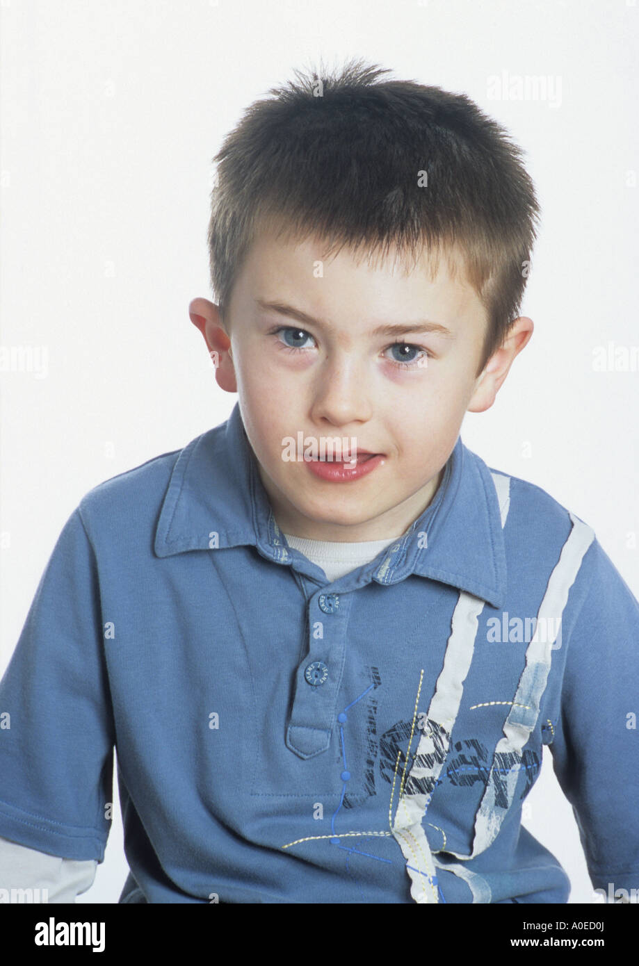 Seven Year Old Boy In Studio Portrait in the uk Stock Photo Alamy