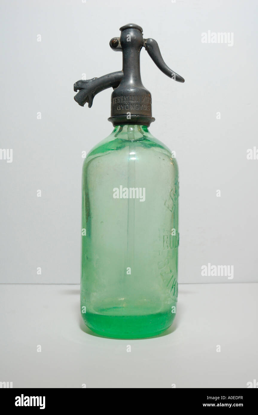 Old style glass soda water bottle with metal Syphon Stock Photo