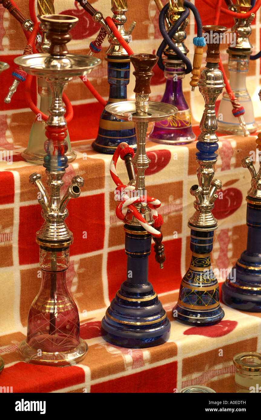 Nargila Arab water pipes of different sizes shapes and colour on display at the market Stock Photo
