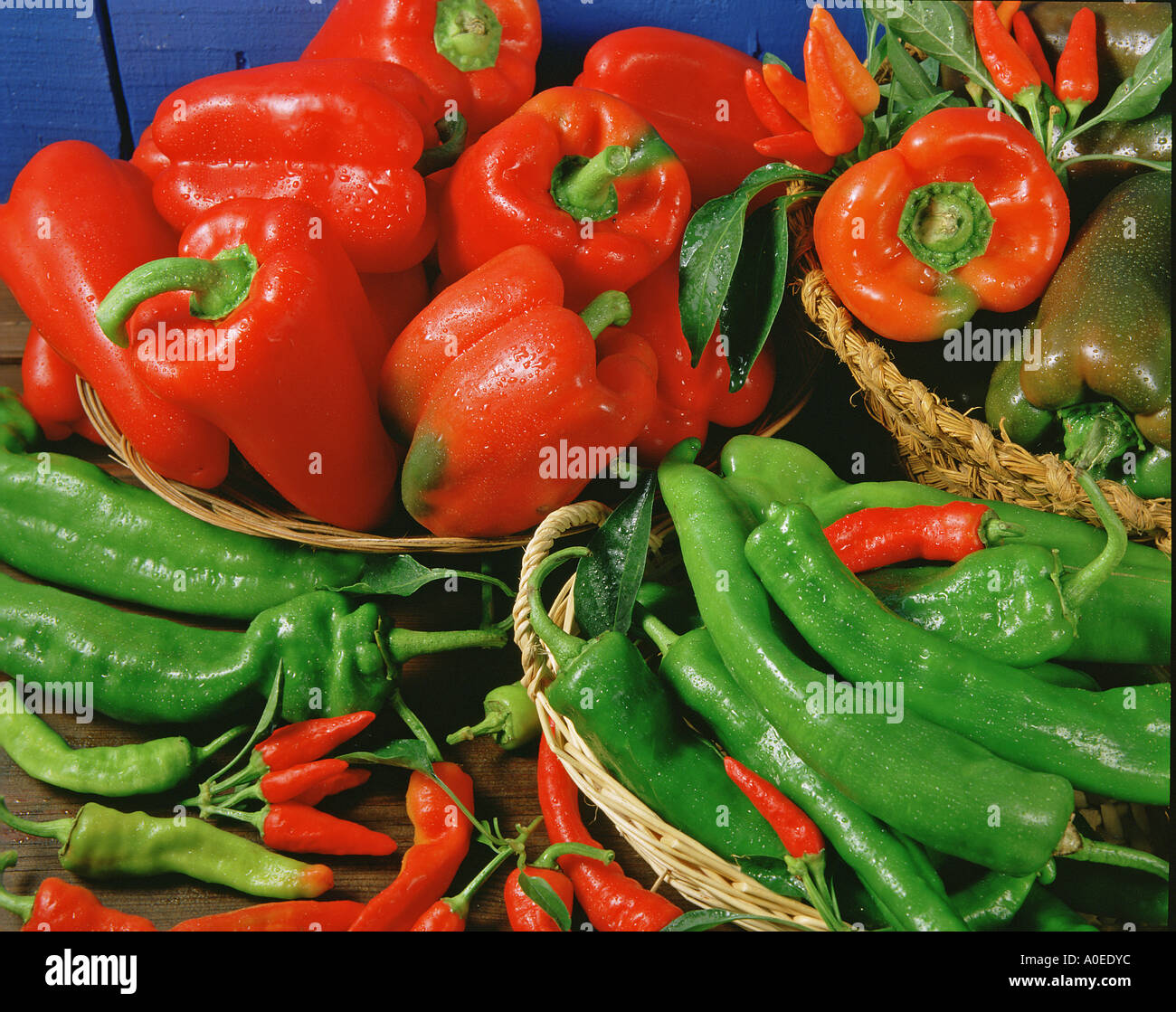 One red and many green peppers hi-res stock photography and images - Alamy