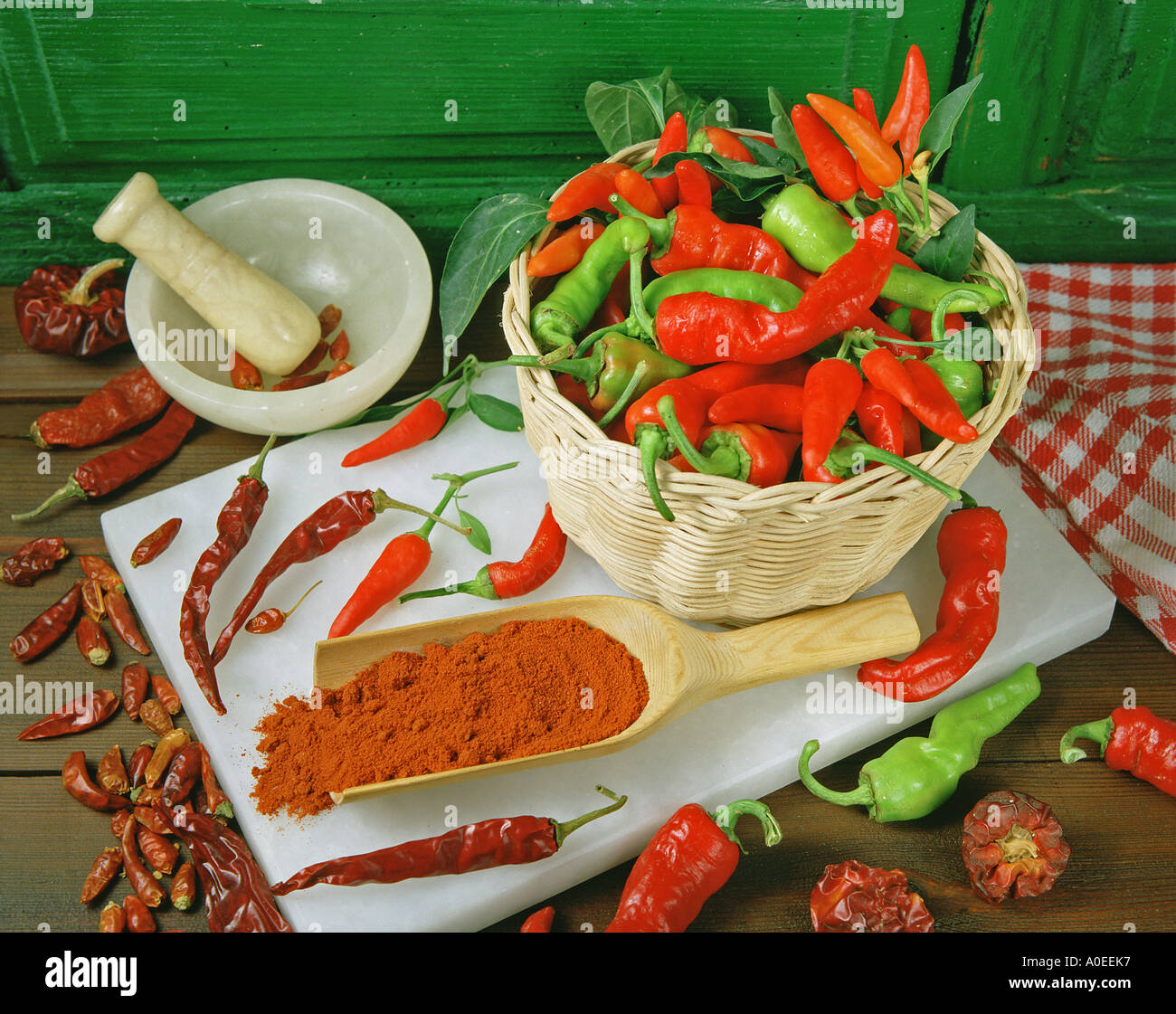 One red and many green peppers hi-res stock photography and images - Alamy