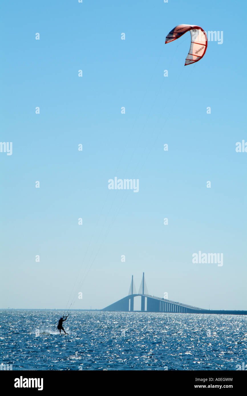 Kitesurfing Kiteboarding with a backdrop of the Sunshine Skyway Bridge