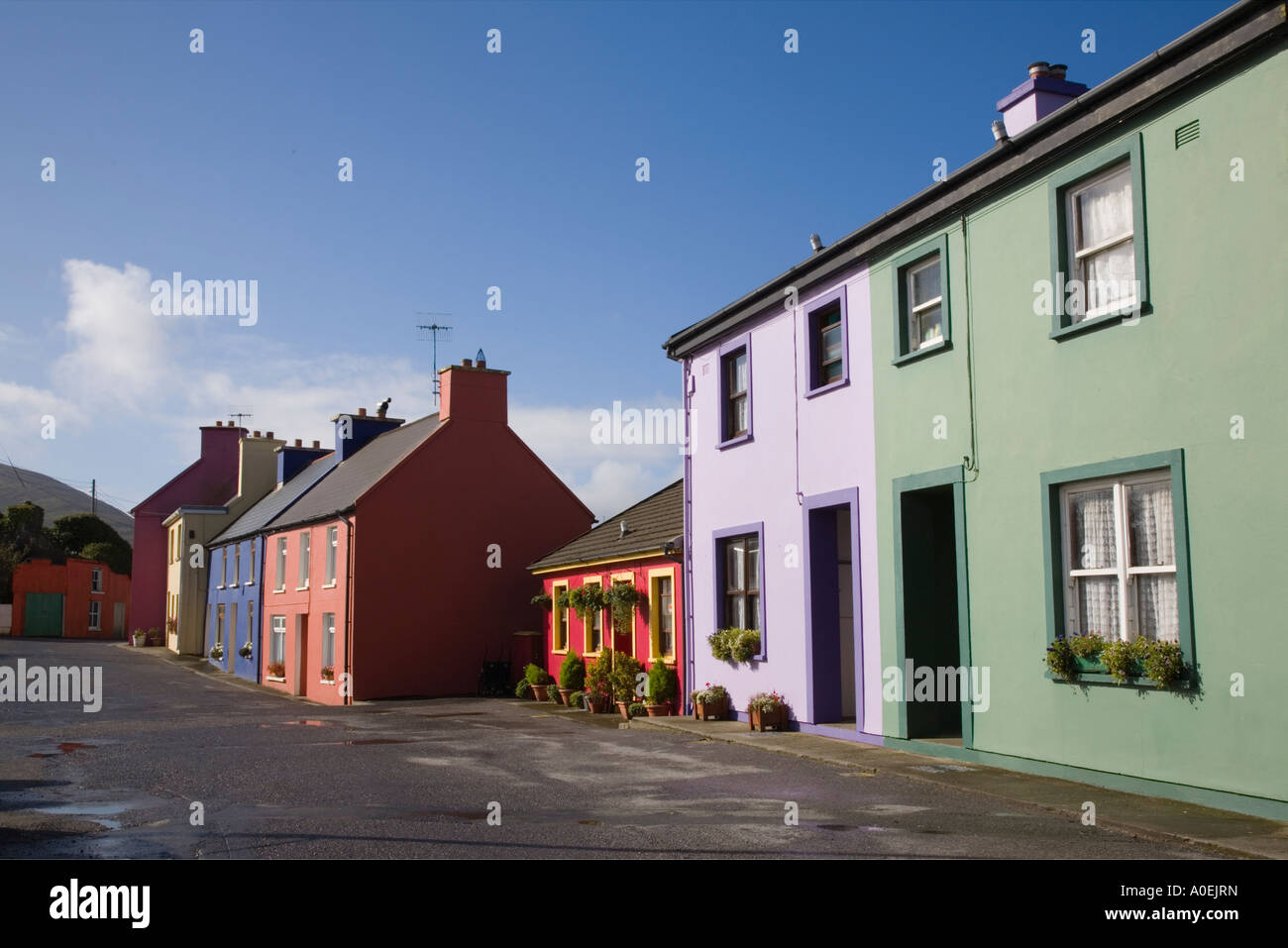 Row of colourful houses in main street of historical village on Ring of Beara tourist route. Eyeries Co Cork Eire Ireland Stock Photo