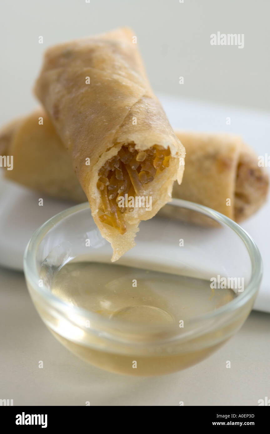 Small Thai spring rolls with sweet dipping sauce Stock Photo