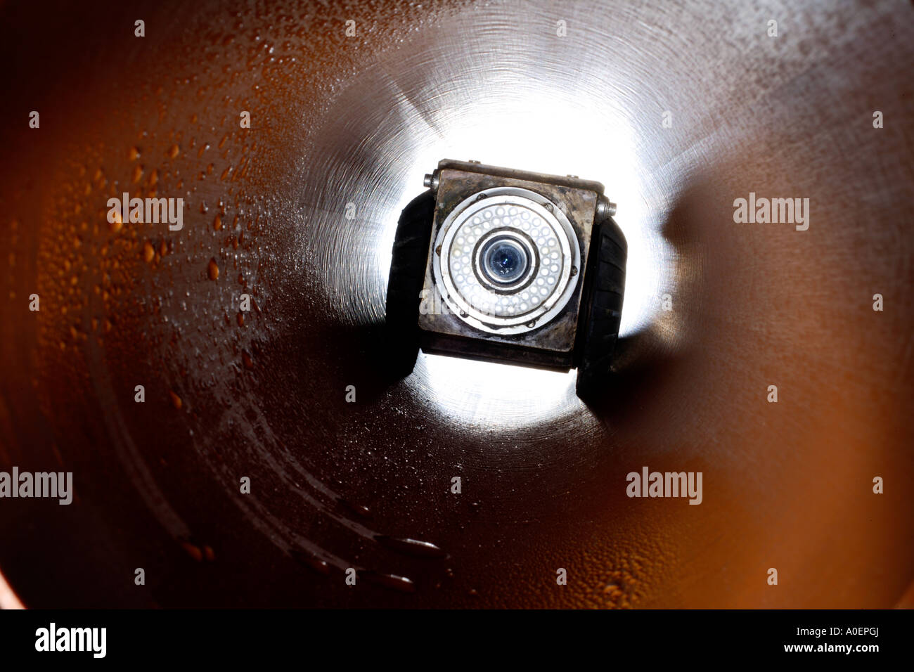 Remote controlled video camera in drainage pipe recording an internal