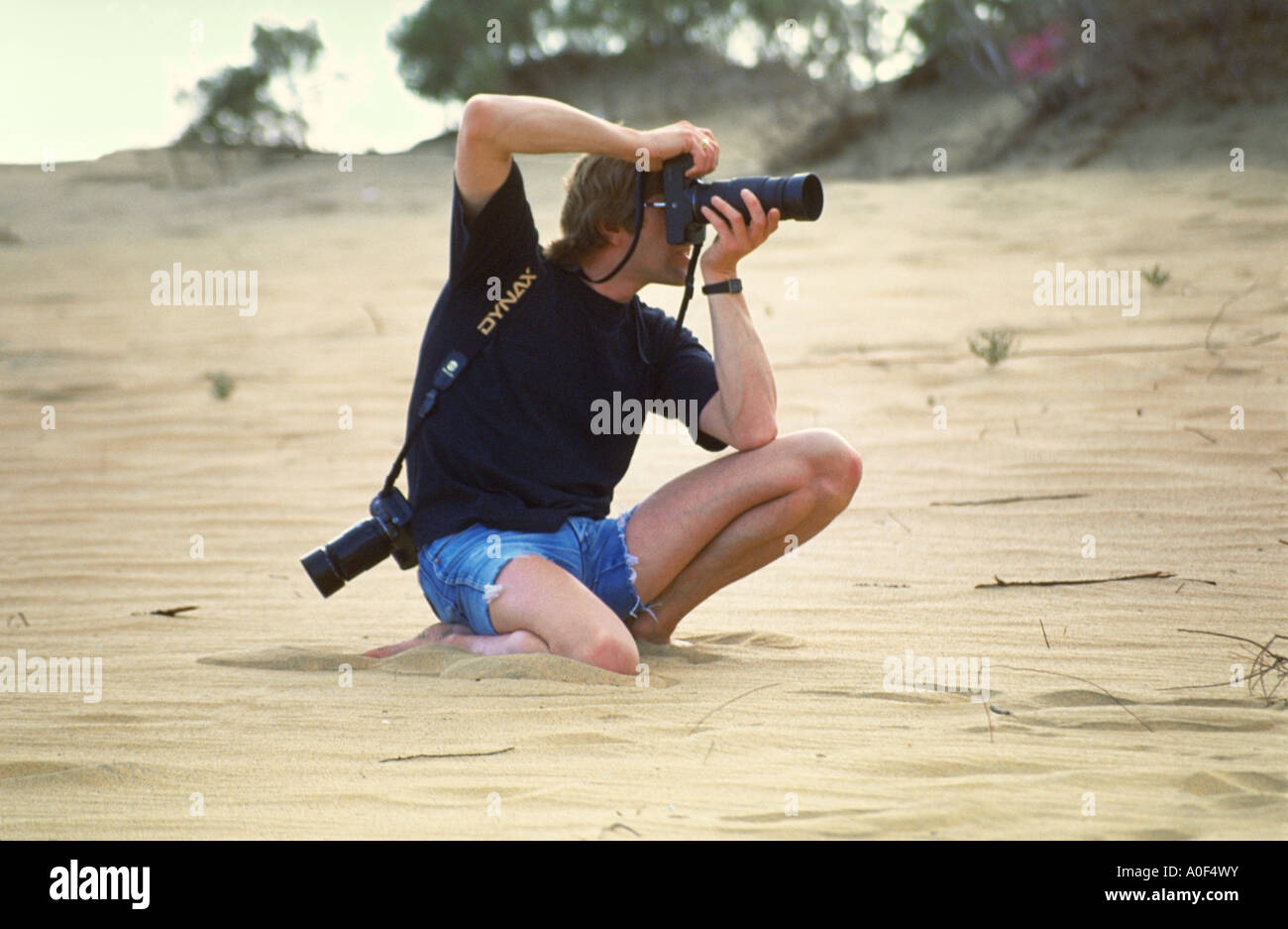 Kneeling picture hi-res stock photography and images - Alamy