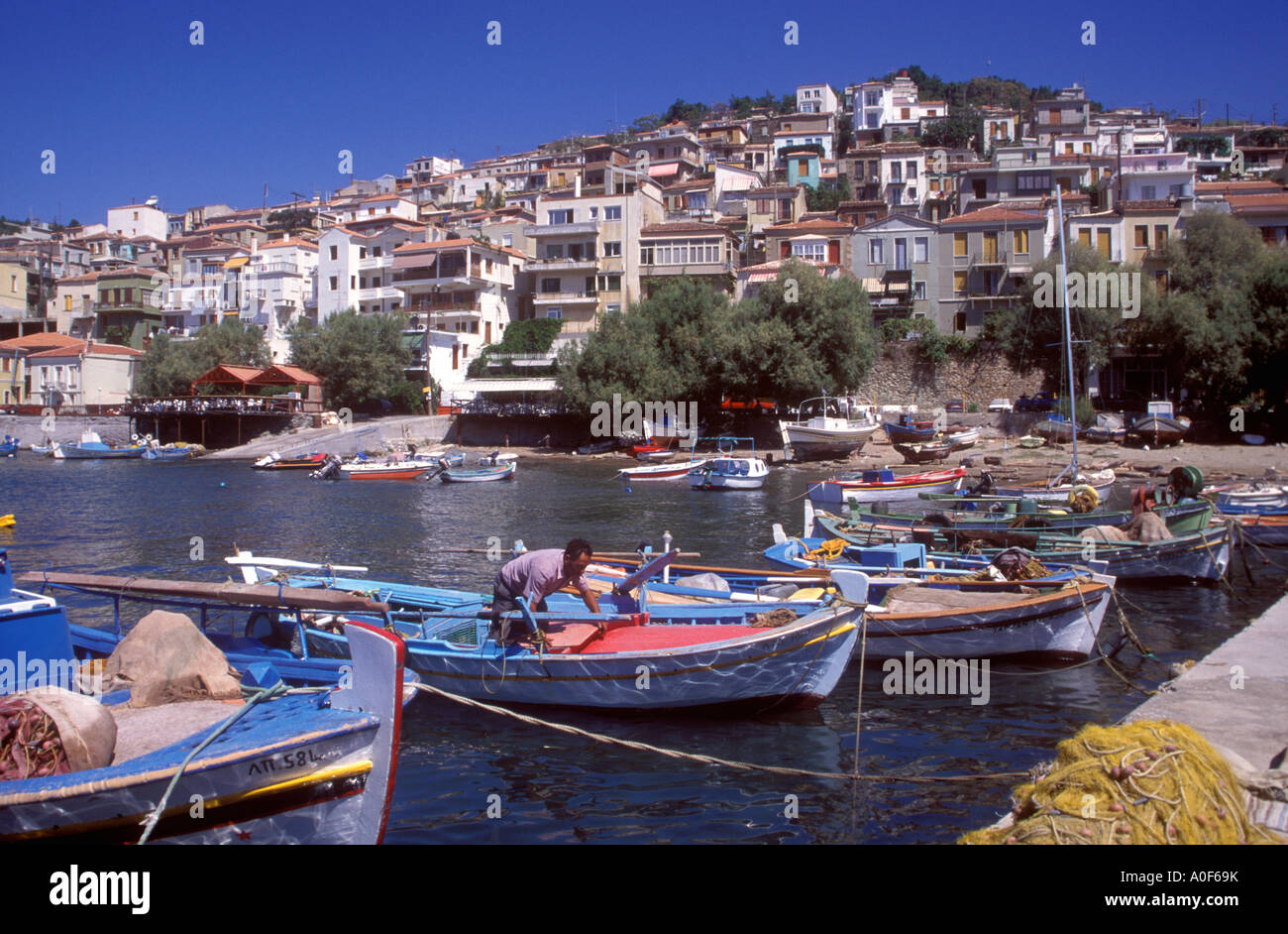 Lesbos - The picturesque fishing harbour and town of Plomari Stock Photo