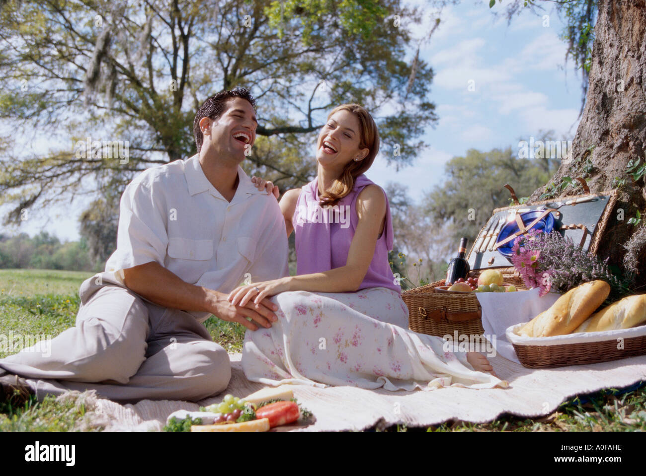 Couple on picnic mat hi-res stock photography and images - Alamy