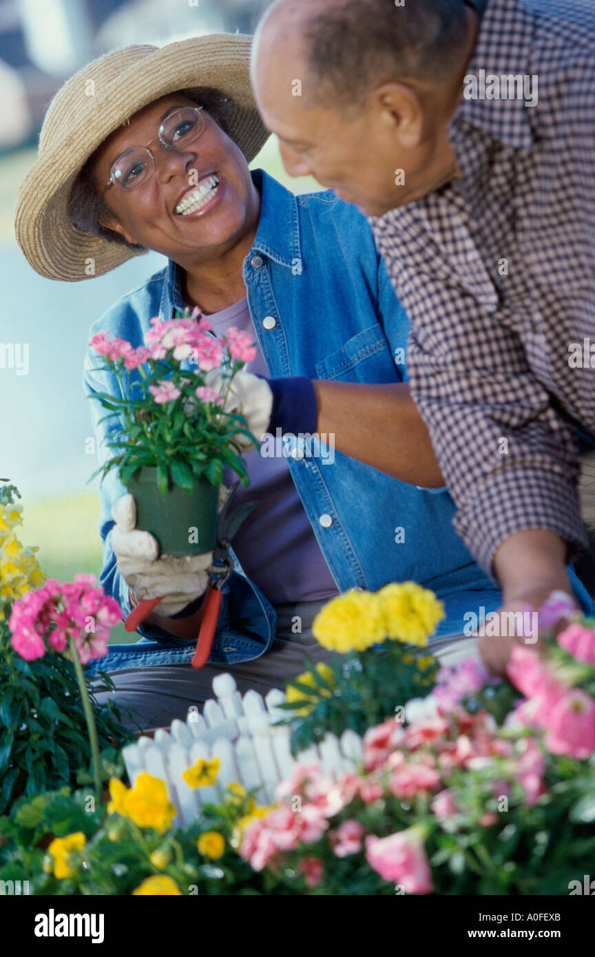 African couple man woman gardening hi-res stock photography and images ...