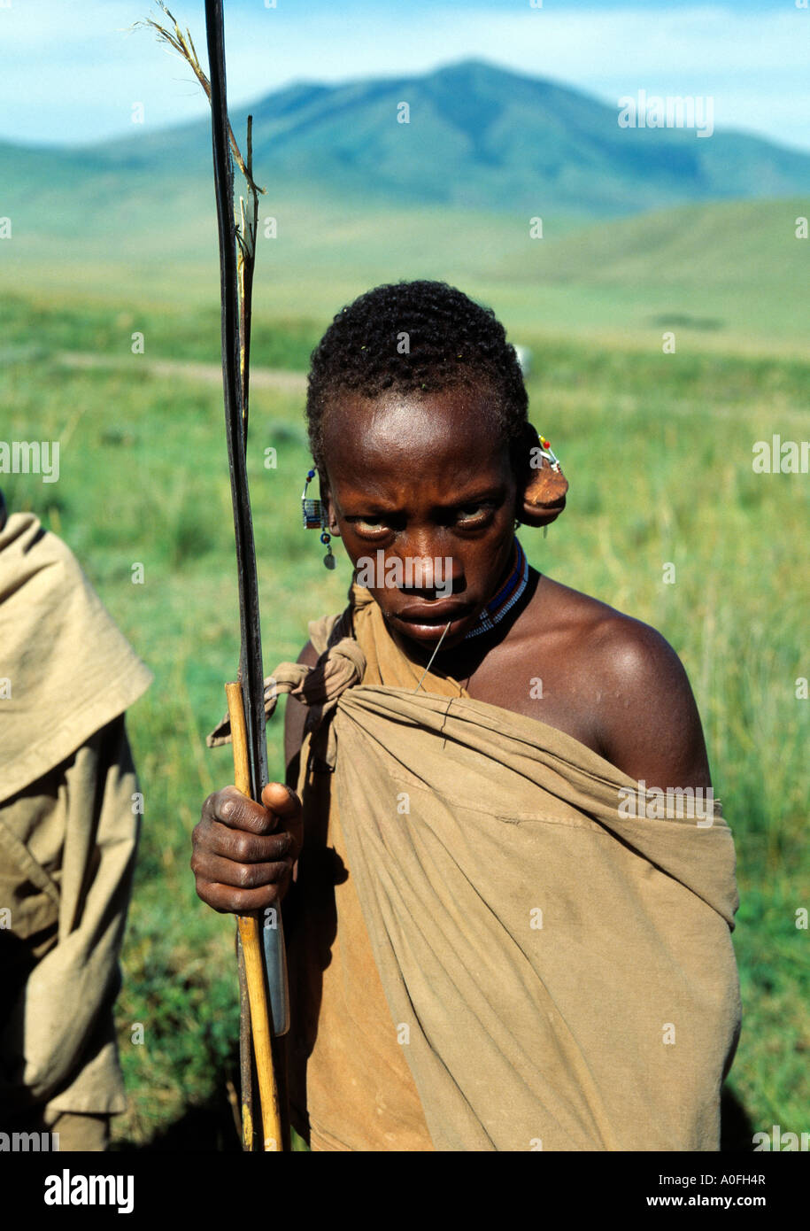 young african masai covered with sack, with sphere, and ear ornaments, Stock Photo