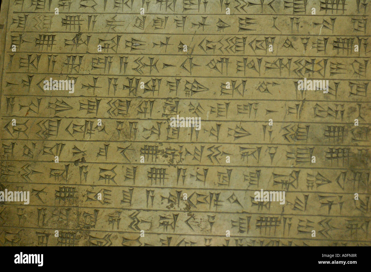 Ancient Persian script written on a piece on display in Tehran national museum, Iran. Stock Photo