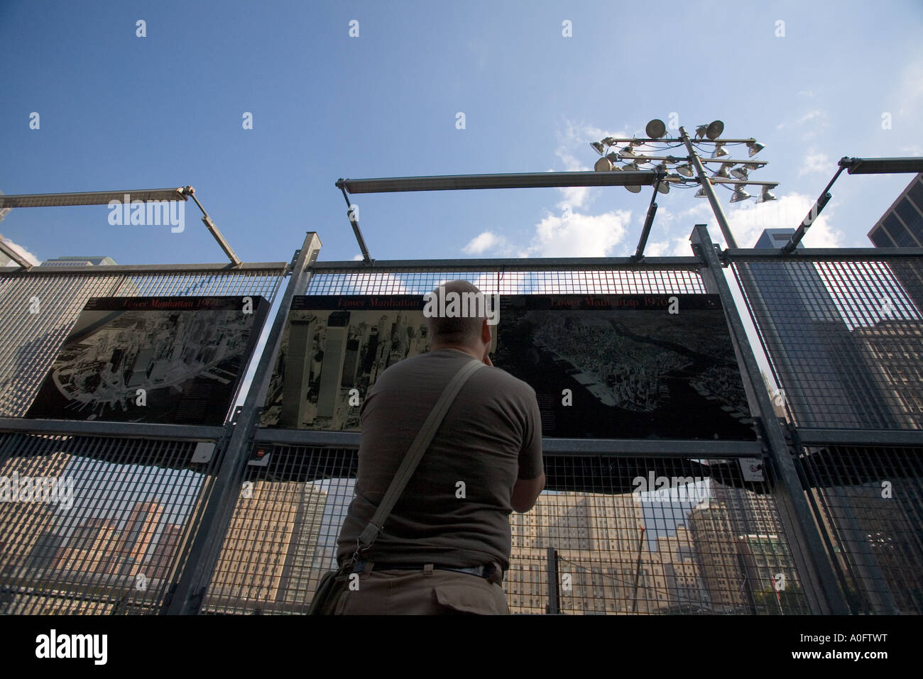 man reading ground zero history on signs Stock Photo Alamy