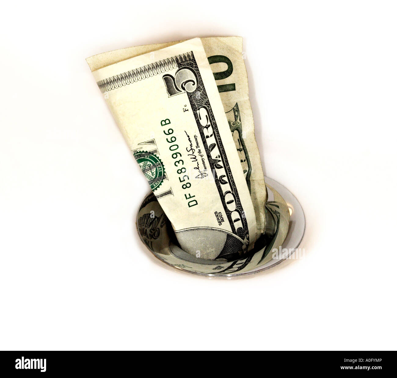 Throw money down the drain hires stock photography and images Alamy