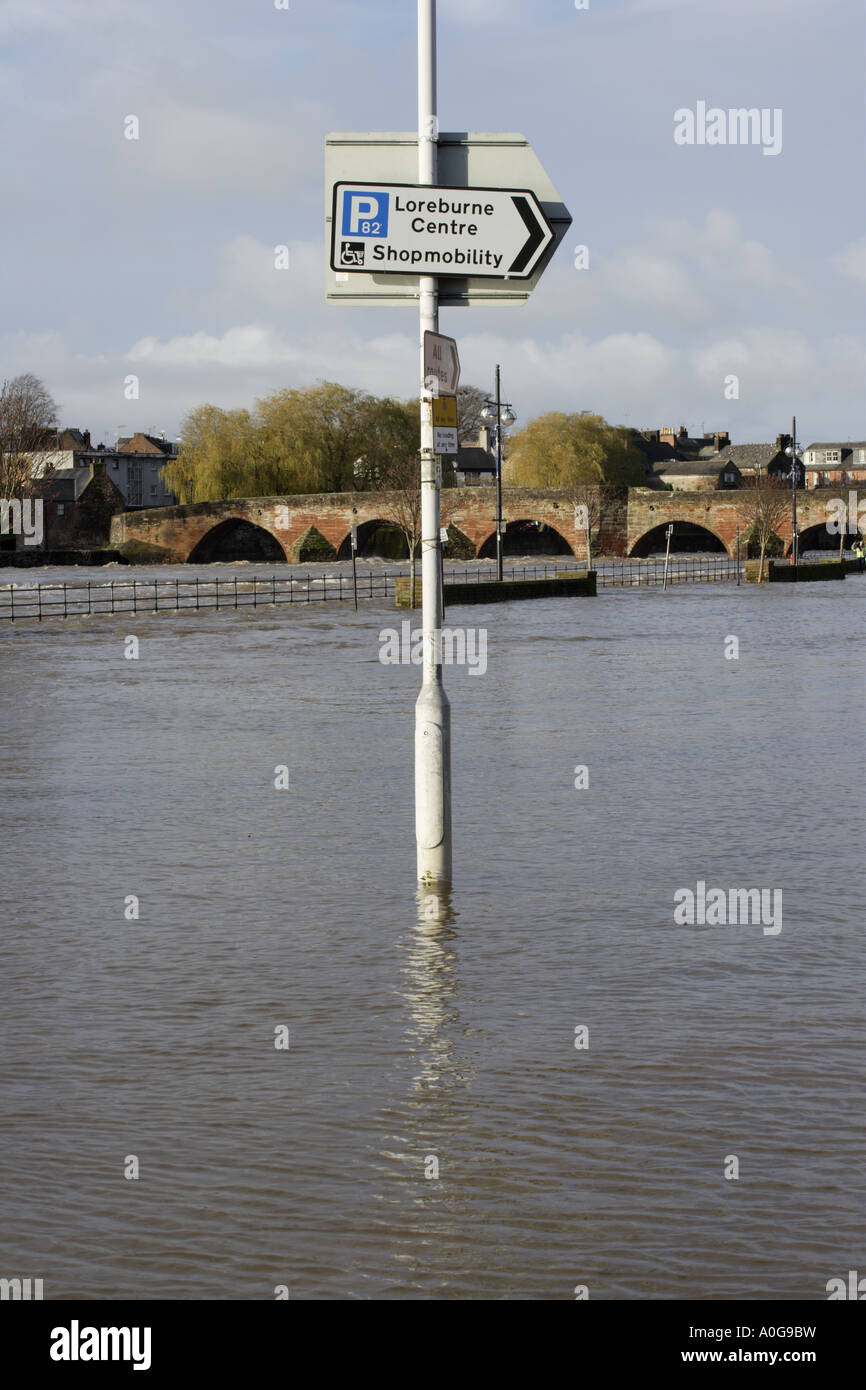 Flood under water parking on a flooded Whitesands River Nith burst its banks in Dumfries town centre Scotland UK Stock Photo