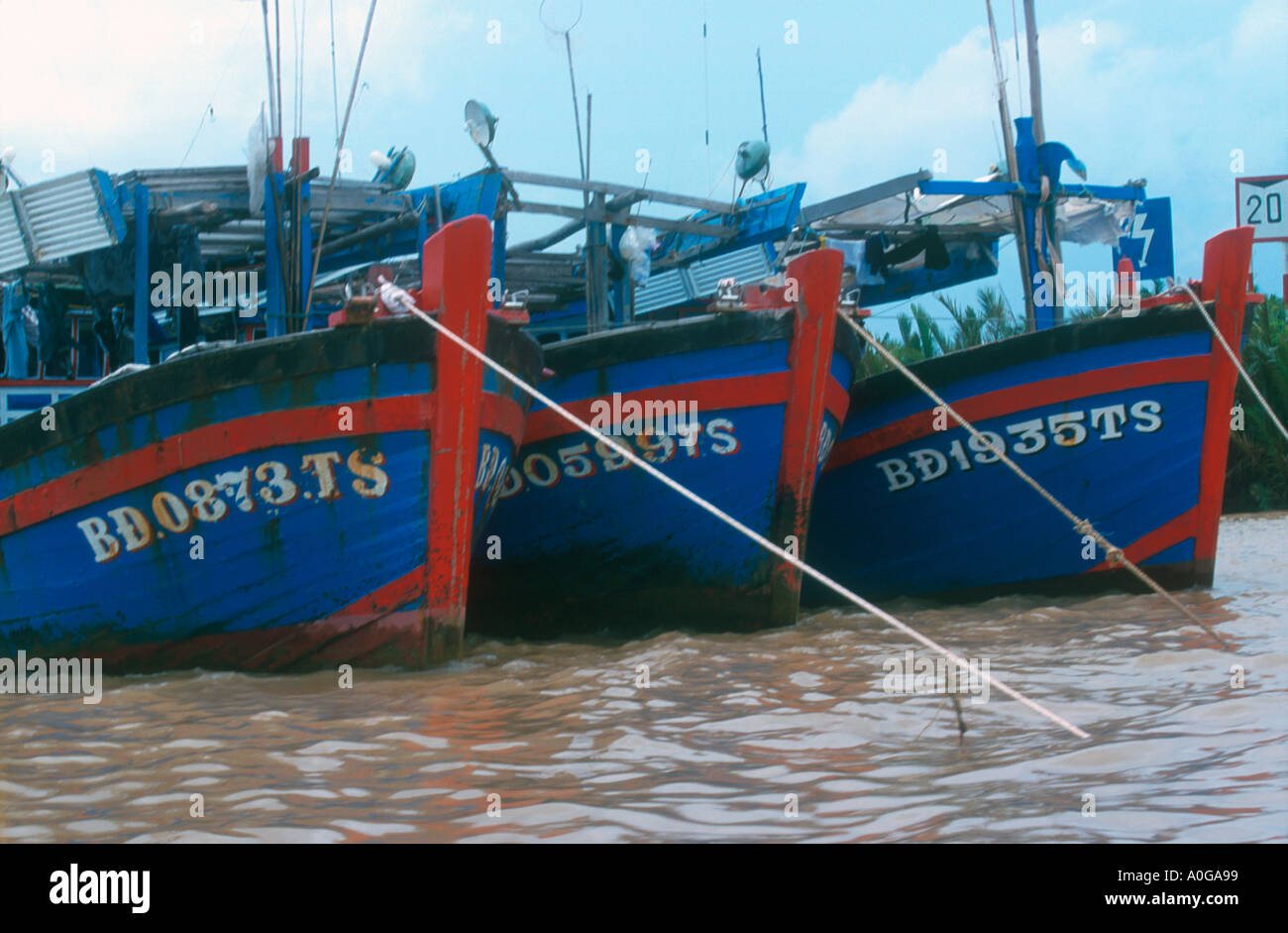 Fishing boats tied up Mekong Delta Vietnam Stock Photo - Alamy