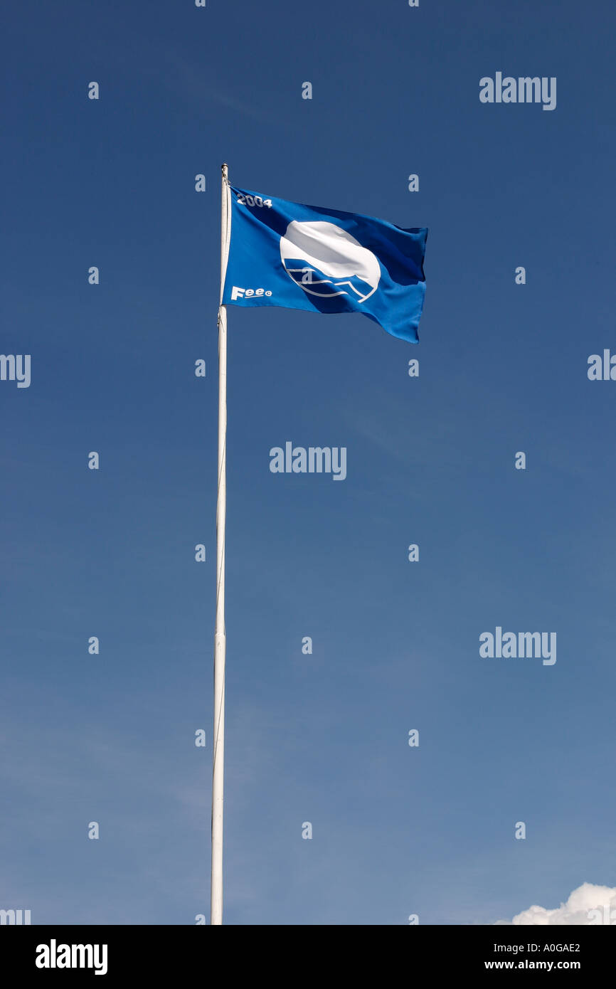 beach with blue EC flag Stock Photo
