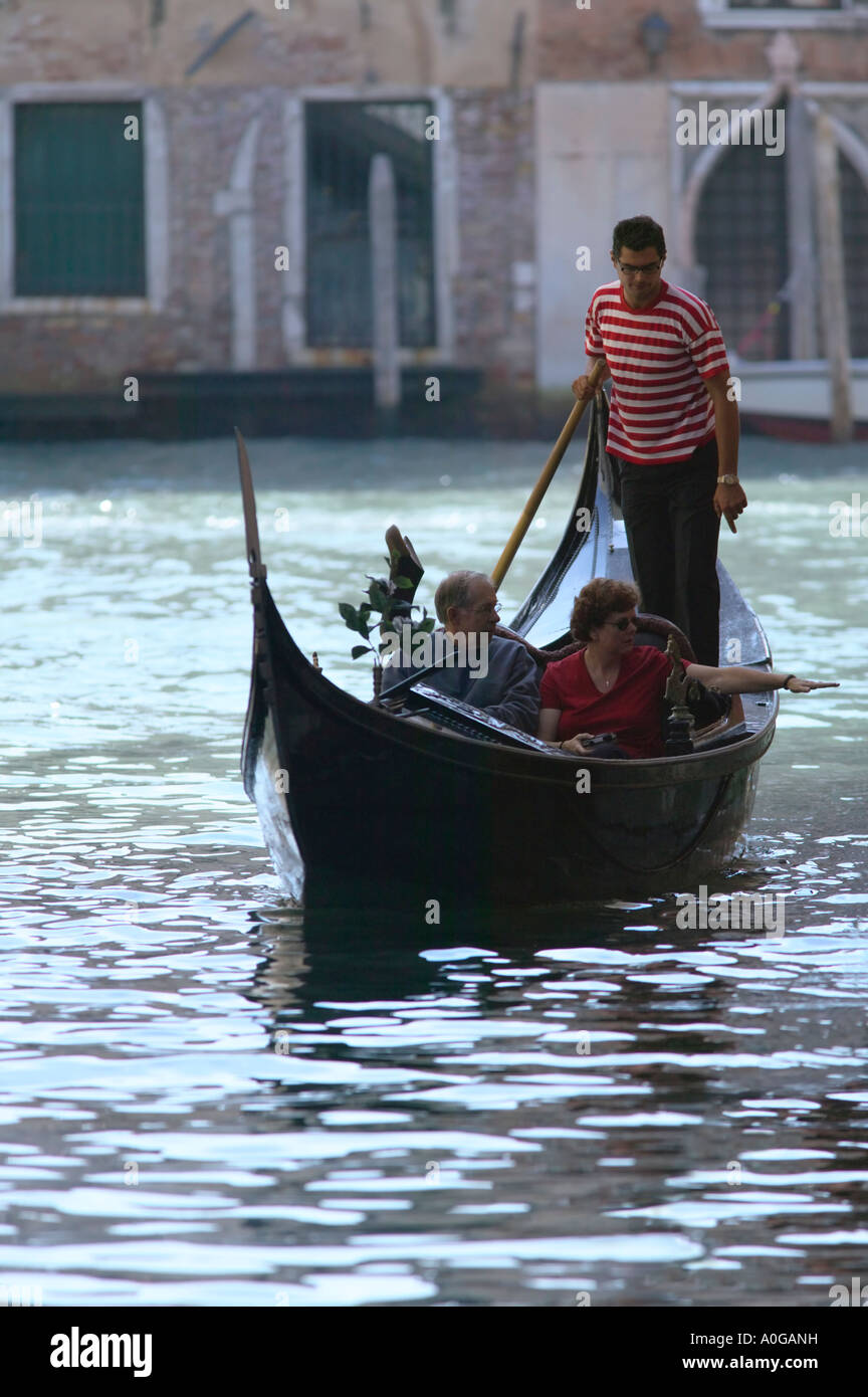 Elderly couple in gondola venice hires stock photography and images