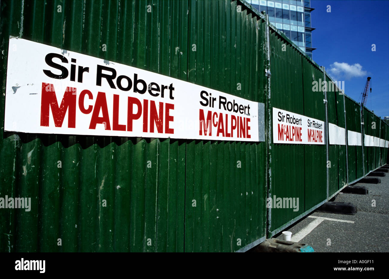 Sir Robert McAlpine Fencing around new build site Manchester England Stock Photo