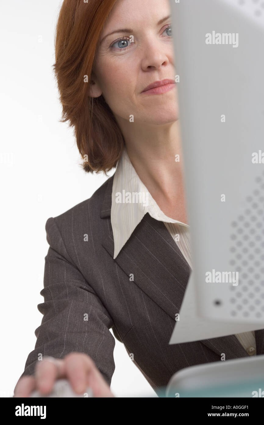 Businesswoman working on computer Stock Photo