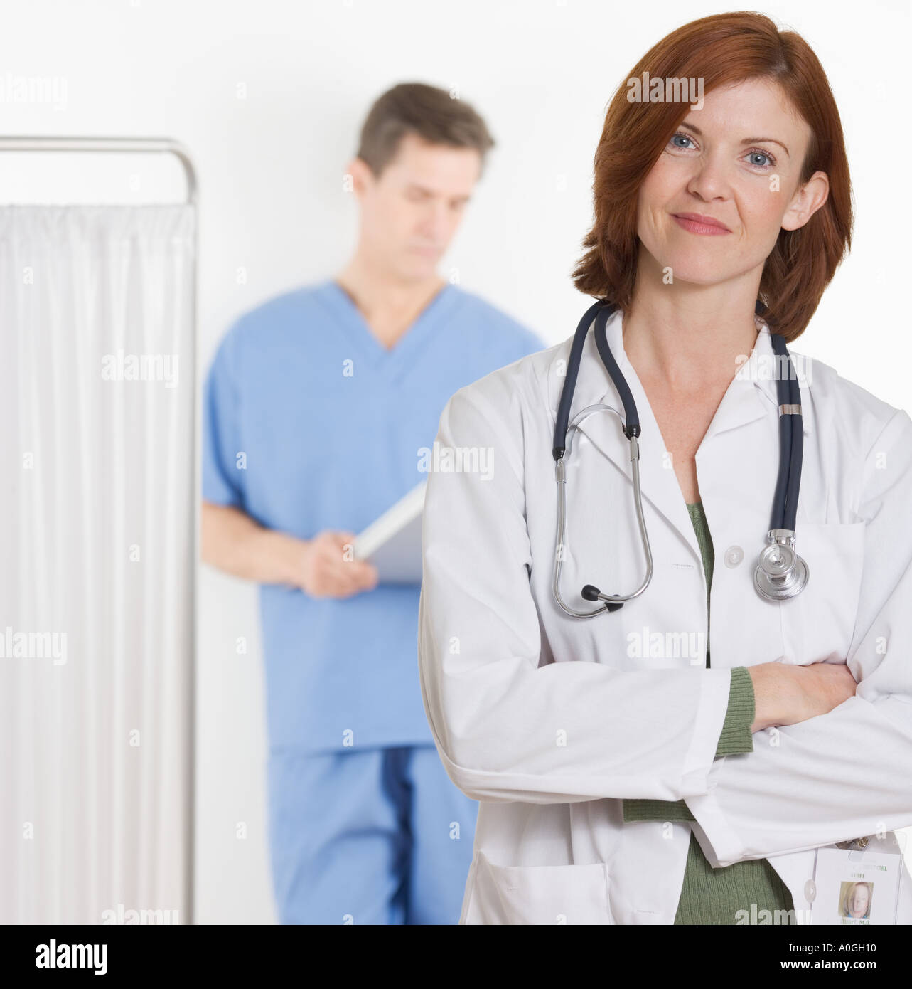 Female doctor smiling confidently Stock Photo